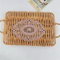 Close-up showing the intricate floral embroidery on a pink hollow lace table mat coaster - Dusty Pink