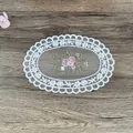 Close-up of the vintage floral embroidery detail on an oval white lace placemat - A Hole Style / 17*23cm White