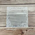 Exquisite white floral lace table mat with delicate embroidery on wood plank background - Square Bow Style / White
