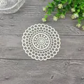 Close-up of off-white French embroidery lace coaster with hollow flower design - 14cm / Beige