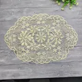 Intricate floral lace placemat with elegant scalloped edges on a wooden background - 30*45cm / Camel