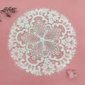 Detailed view of white French embroidery lace coaster with intricate floral patterns - 27*27cm / Milky White