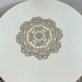 Macro view of detailed floral embroidery on a vintage-style hollow-out lace coaster - 28cm Round / Grey Camel