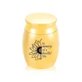 Small gold keepsake cremation urn for ashes with engraved sunflower and memorial text. - Gold