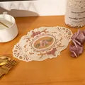 Vintage cream lace coaster with elegant pink floral embroidery on a warm wooden table - u10290 Oval Style (u10290) / 16x23cm / White
