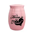Close-up of pink cremation urn featuring Always in my Heart engraving with heart - Always In My Heart Style / Pink