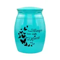 Detailansicht einer türkisen Tierurne mit Schmetterlingsmuster und rührendem Spruch - Butterfly Text Style / 1 Stück / Blau (Schmetterling)