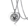 Close-up of heart-shaped stainless steel cremation necklace with US Navy emblem. - Engraved Version