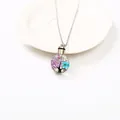 Detailed view of glass urn necklace pendant containing colorful dried flowers and tree motif - Style 6 (43522345)