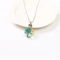 Elegant round glass locket necklace with blue dried flowers for memorial ashes urn - Style 4 (43522345)