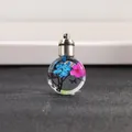 Round glass urn pendant with blue and pink dried flowers and a silver metal screw cap. - Style 8 (43522345)