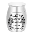Detail showing the 'Guardian Angel' engraving on a small silver cremation urn - Husband / 40x30mm / Silver
