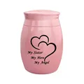 Small pink memorial cremation urn for sister with heart and tribute text. - SISTER / Pink