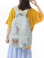Modern light blue Korean style backpack featuring a padded handle and cute plush bear charm - Light Blue