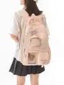 Korean-style peach pink school backpack with padded handle and cute bear detail. - Pink