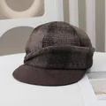 Detailed view of a vintage wool plaid newsboy cap in brown for autumn and winter style - Dark Coffee Variegated Weave (Dark Brown Brim)