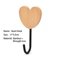 Decorative heart-shaped natural bamboo wall hook with black metal hanger for home decor - 11x5.5cm / Heart Style