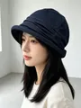 Stylish navy blue pleated bucket hat for women featuring a soft denim fabric design - Navy Blue