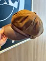 Detail view of suede newsboy cap with PU leather brim in brown - Dark Coffee