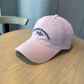 Pink washed cotton baseball cap with blue fish embroidery and letter details for women - Pink