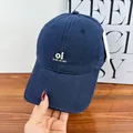 Premium navy blue baseball cap with white embroidered oi look at me text for daily wear - Navy Blue