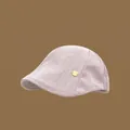 Élégante casquette gavroche rétro rose pour femme avec texture rayée et étiquette dorée - Rose