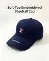 Close-up of navy blue baseball cap with apple core embroidery and YOUTH DAYOFF text. - Navy Blue