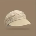 Elegant beige pleated fabric sun hat with woven straw brim and decorative metal accent - Fabric and Straw Patchwork Style / Off White