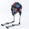 Bohemian handmade crochet beanie with colorful floral patterns and long decorative tassels - Black