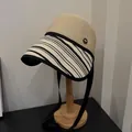 Fashionable women's summer woven bucket hat with striped brim and black ribbon straps - Beige Zebra Patchwork