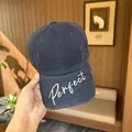 Detail shot of navy blue cotton baseball cap with white Perfect embroidery on brim - Regular (55-59cm) / Navy Blue