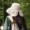 Wide brim sun hat with neck protection and bow detail for summer UV protection. - Off White