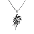 Close-up view of a tribal swirl flame pendant necklace featuring a vintage silver metal finish - Spiral Totem Style (A-2673)