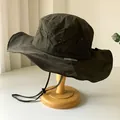 Dark olive wide-brim sun hat for hiking, featuring breathable laser-cut ventilation. - Army Green
