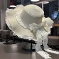 Sombrero de paja de copa plana para mujer con lazo de encaje blanco y ala ancha para sol - Blanco Roto