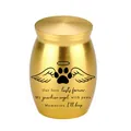 Small golden aluminum alloy pet cremation urn with engraved paw and wings design - 30x40mm / Gold
