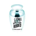 Close-up detail of white aluminum memorial urn featuring a cowboy rodeo illustration - 65x45mm / Sky Blue Jar 65x45mm
