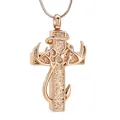 Detail shot of a rose gold antler cross pendant with textured cremation urn design. - Rose Gold