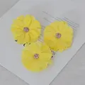 Three yellow artificial fabric daisy flower heads for DIY crafts and hair accessories - Yellow