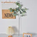 Lifelike artificial eucalyptus branch with berries for home decor and floral arrangements - Off-White