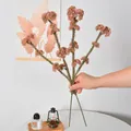 Einzelner langer künstlicher rosa Reisbeeren-Stiel für Hochzeits- und Tischdekoration - Herbstrosa
