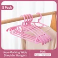Pack of 5 pink wide-shoulder seamless plastic hangers for non-slip clothes drying and storage - Stackable Wide Shoulder Style / 5 Pieces / Pink