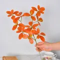 Lifelike artificial orange Pieris japonica branch for elegant home interior decoration. - Mangrove Autumn Color