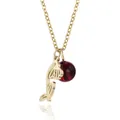 Close-up detail of gold titanium steel necklace with hollow flower and dark red bead. - January Snowdrop