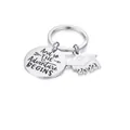 Stainless steel graduation keychain with "Adventure Begins" engraved round pendant - Silver (2022)