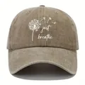 Detailed view of a vintage washed denim baseball cap featuring Just Breathe dandelion print - Adjustable / Khaki