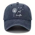 Detail of washed navy denim baseball cap featuring dandelion and 'just breathe' print - Adjustable / Navy Blue