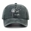 Close-up of vintage washed denim cap with 'just breathe' dandelion print - Adjustable / Army Green