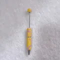 Detailed view of candy color handmade rhinestone encrusted ballpoint pen on white background - Lemon Yellow