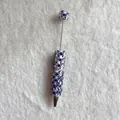 Detailed macro view of a handmade beaded ballpoint pen with purple butterflies and pearls. - Solid Purple Butterfly Style (蝴蝶圆珠笔)